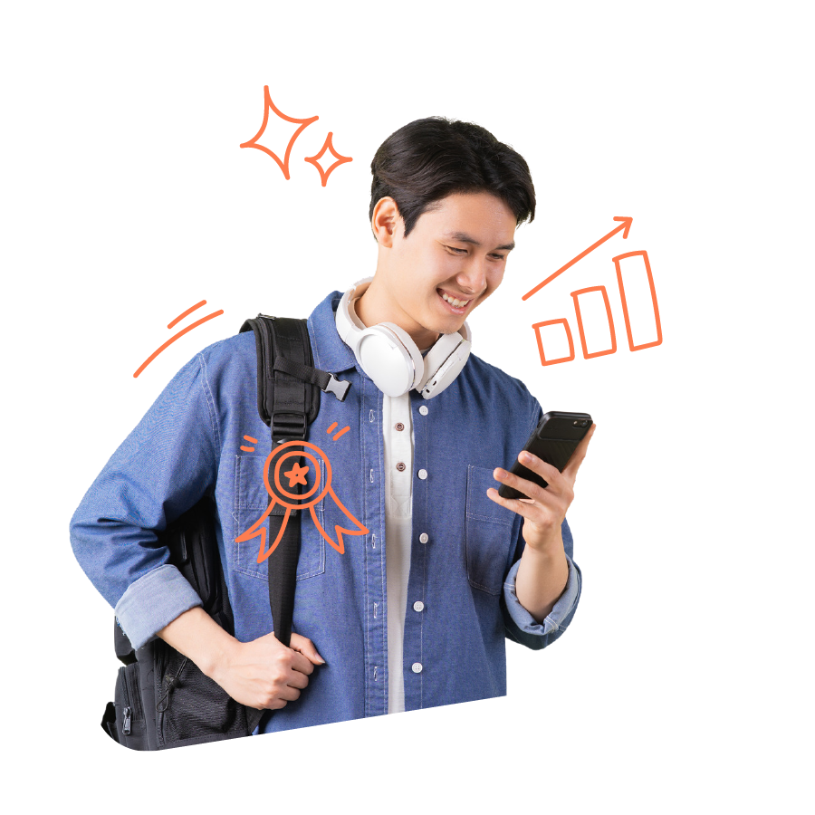 High school student looking at his phone and smiling High school student looking at his phone and smiling